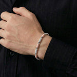 Dual tone textured link bracelet with silver and rose gold accents