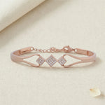 Rose gold bracelet with triple geometric diamond design and open band style