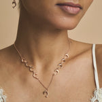 Rose gold dolphin charm necklace with matching dangling earrings set