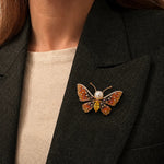 Amber crystal butterfly brooch with pearl centre and colourful stones, elegant statement pin design