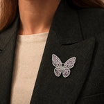 Pink crystal butterfly brooch pin with intricate wing design and sparkling stone detailing