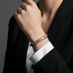 Crystal bar leather bracelet with braided strap and rectangular stone detailing in a sleek modern design