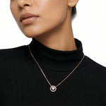 Rose gold necklace with pink heart crystal pendant and circular halo design for women