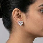 Sparkling crystal heart halo stud earrings with baguette stones and elegant silver finish