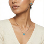 Rose gold Mangal sutra necklace set with turquoise round pendant and matching blue stone stud earrings