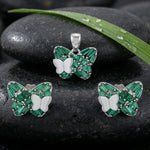 Emerald green butterfly pendant and stud earrings jewelry set with sparkling crystal stones and silver finish design.