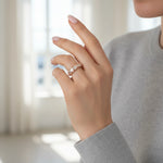 Rose gold baguette crystal band ring with textured design and sparkling stone accents for women