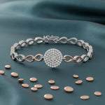 Dual tone circle bracelet with sparkling pave centrepiece and elegant linked chain design for women