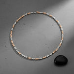 Modern dual tone bar necklace with rose gold and silver textured links in a sleek polished finish