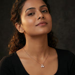Elegant rose gold clover heart pendant necklace with crystal detailing and delicate chain for women