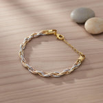 Luxury braided dual tone bracelet with twisted chain texture and adjustable clasp for women