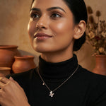Rose gold butterfly drop pendant necklace with crystal detailing and elegant minimalist chain design for women