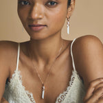 Rose gold prism jewellery set with white drop pendant necklace and matching crystal earrings