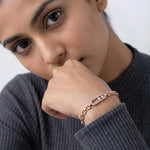 Rose gold link bracelet with double round stones and oval centrepiece, minimal modern design jewellery
