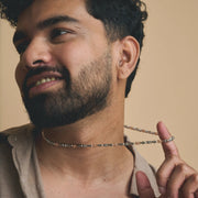 Dual tone geometric link chain with silver and rose gold accents