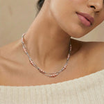Delicate blush pink beaded chain necklace with fine silver links and adjustable clasp