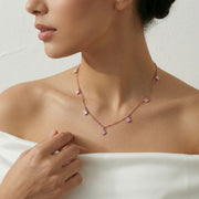 Blush pink clover charm chain necklace with delicate rose gold tone finish