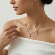 Rose gold heart drop necklace with crystal accents and delicate chain