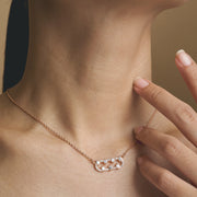 Elegant rose gold crystal bar pendant necklace with delicate chain
