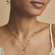 Rose gold dolphin charm necklace with matching dangling earrings set
