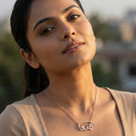 Rose gold floral heart necklace and earrings set with crystal detailing and delicate flower design