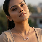 Rose gold floral heart necklace and earrings set with crystal detailing and delicate flower design