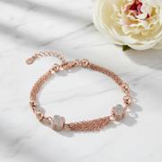 Flower Shape Beads Connected with Multi Layer Chains in Bracelet