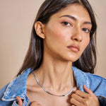 Sleek braided silver chain necklace with smooth finish and minimal clasp
