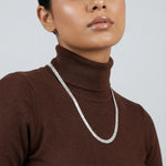 Sleek braided silver chain necklace with smooth finish and minimal clasp