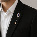 Royal blue floral brooch pin with crystal petals and gold tone finish