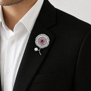Crystal floral brooch pin with pink centre stone and pearl accent in silver tone design