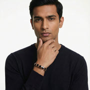 Rose gold bracelet with black enamel rectangular links and polished modern design