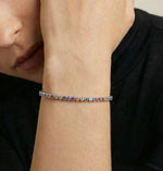 Elegant rainbow crystal tennis bracelet with multicolour stones and sleek modern link design
