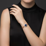 Rose gold mesh bracelet with blue crystal square centrepiece and sparkling stone border