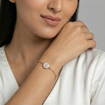 Minimal rose gold bracelet with halo crystal charm and delicate chain design for women