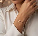 Minimal rose gold bracelet with dangling star charms and sleek chain design