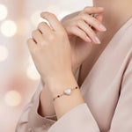 Rose gold heart charm bracelet with pave crystal heart centrepiece and black bead chain detailing