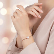 Rose gold heart charm bracelet with pave crystal heart centrepiece and black bead chain detailing