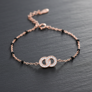 Rose Gold Interlock Bracelet | 925 Silver & Black Spinel