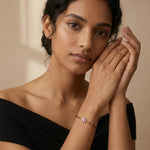 Rose gold pink halo charm bracelet with black bead chain and sparkling crystal detailing