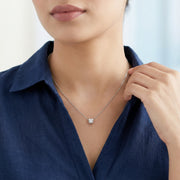 Minimal silver necklace with sparkling solitaire charm pendant on delicate chain for women
