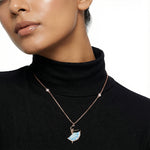 Rose gold ballet dancer pendant necklace with blue enamel dress and elegant box chain design.
