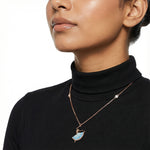 Rose gold ballet dancer pendant necklace with blue enamel dress and elegant box chain design.
