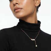 Rose gold leaf pearl drop necklace with crystal accents and dangling pearl charm for women
