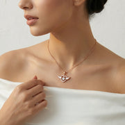 Rose gold angel heart pendant necklace with sparkling crystal centre and wing design for women
