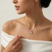 Rose gold triangle pendant necklace with sparkling crystal detailing on a delicate chain
