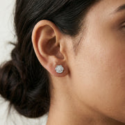 Luxury crystal blossom stud earrings with floral design and sparkling stones in polished silver finish for women
