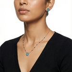 Rose gold Mangal sutra necklace set with turquoise round pendant and matching blue stone stud earrings
