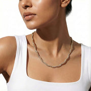 Dual tone twist chain necklace with intertwined silver and rose gold finish
