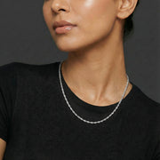 Minimal silver twist rope necklace with braided chain design and polished finish for women’s everyday elegant jewellery.
